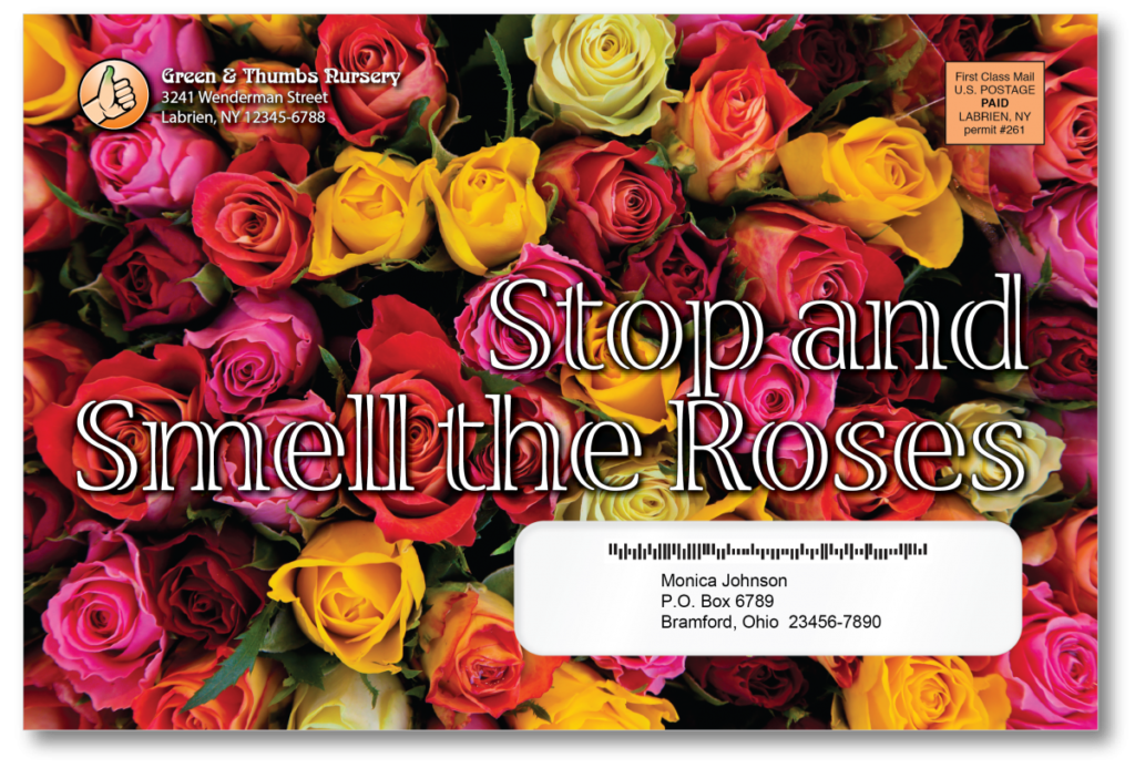 cover of a USPS Tactile, Sensory, & Interactive Mail envelope with red, pink, and yellow roses on it. The envelope reads, "Stop and Smell the Roses"